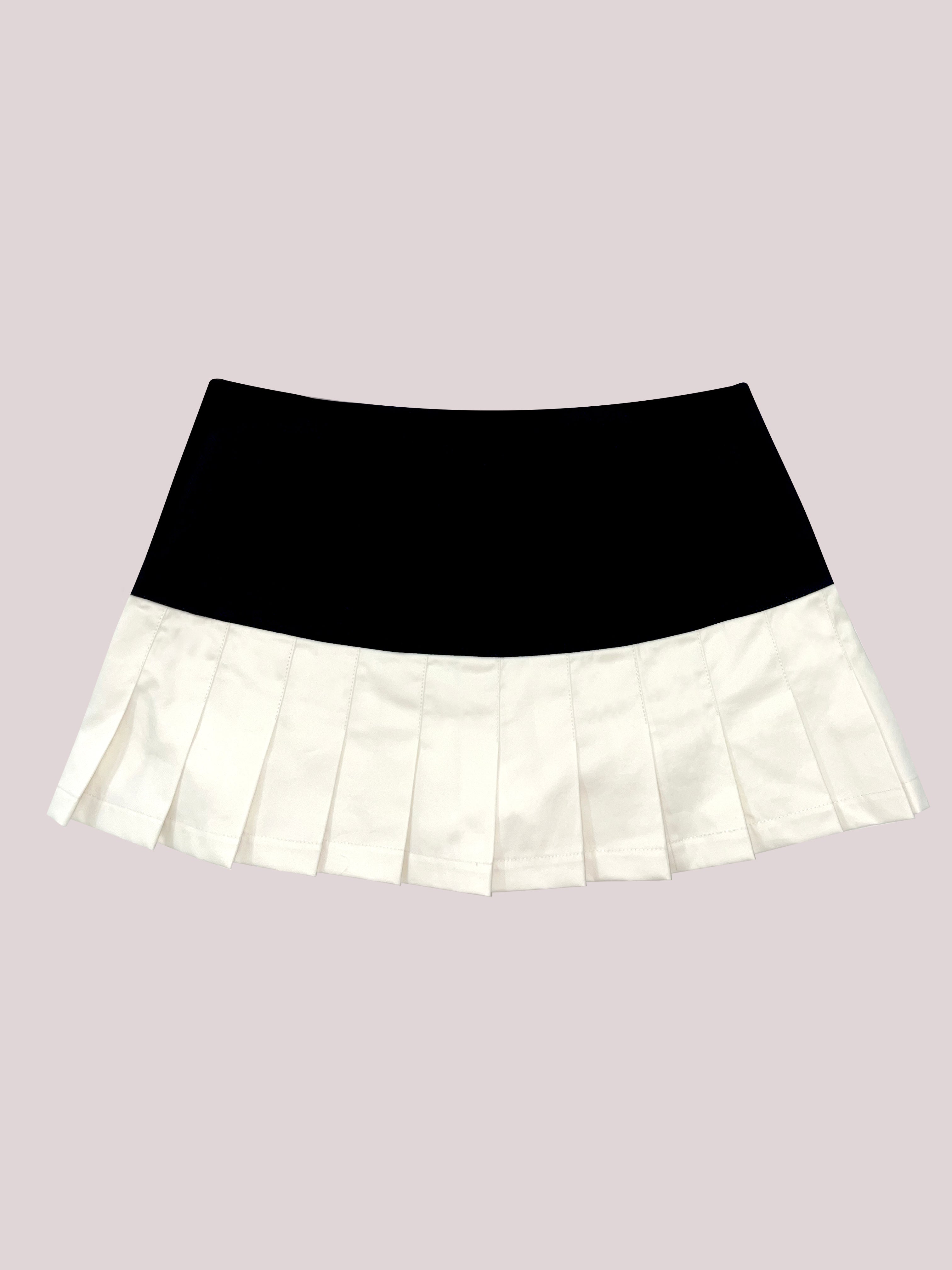 BUTTERFLY PLEATED MINISKIRT